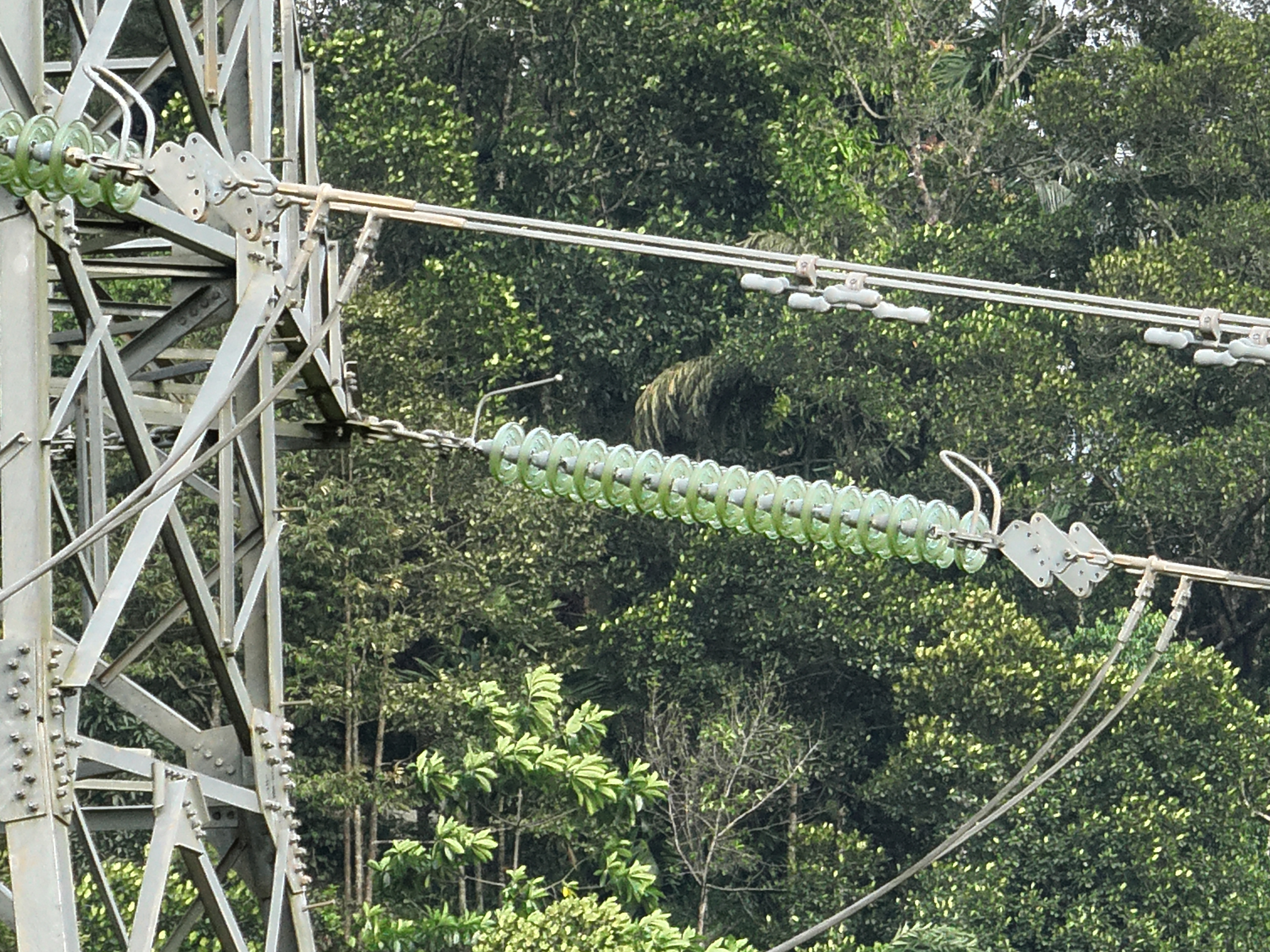 Illustrative placeholder showing a drone inspection route around a power transmission structure
