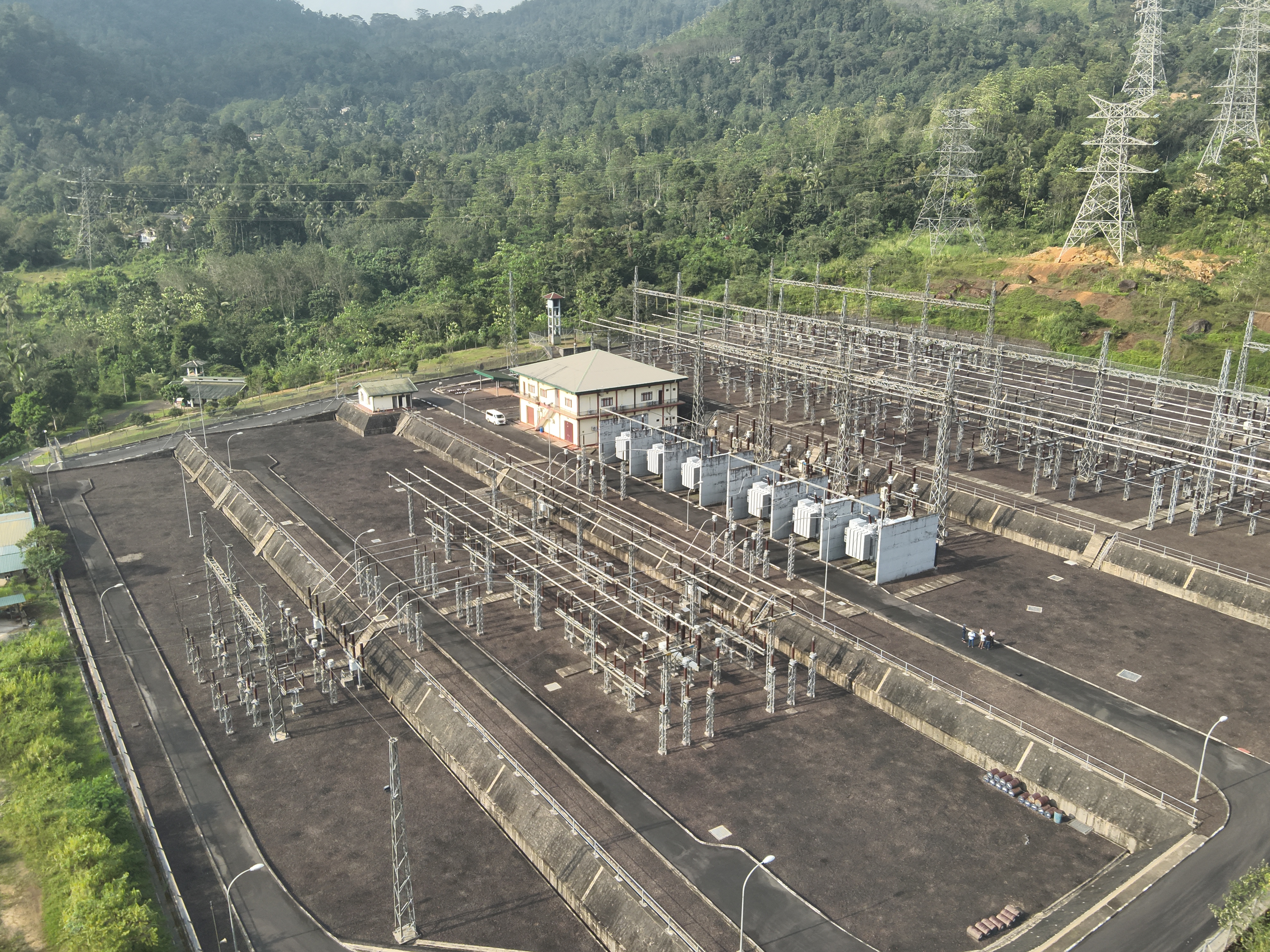 Illustrative placeholder of a drone inspecting electrical power line infrastructure